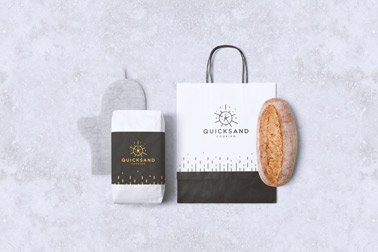 Flour Package, a Paper Bag, and Bread